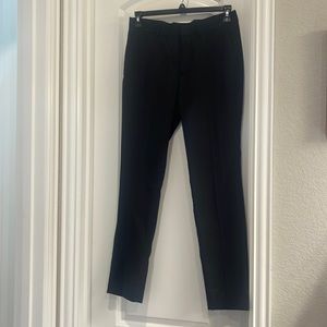 Men’s black dress pants.